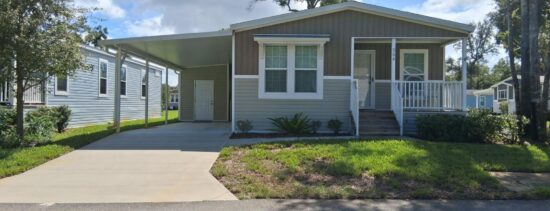 An exterior view of Royal Poinciana: 554 Florida Holly Avenue