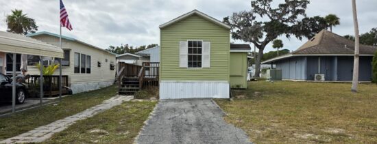 An exterior view of 138 Travel Park Dr. Lot 203