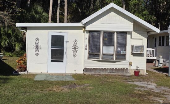 An exterior view of 138 Travel Park Dr. Lot 85