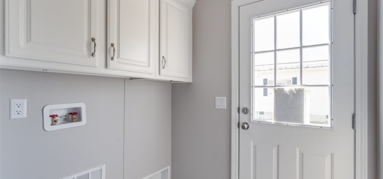 Utility room with washer and dryer hookup