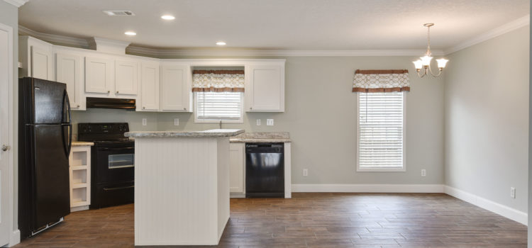Kitchen opens to dining area