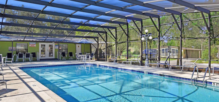Take a refreshing dip in our screened-in swimming pool