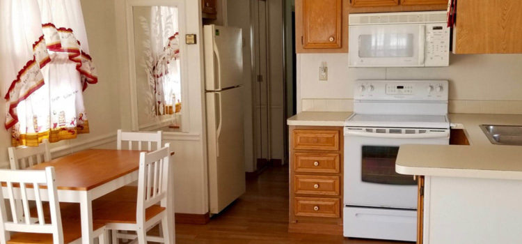 Spacious kitchen opens to living area